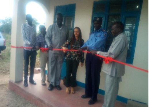 Officials cut a ribbon at the opening of a new protection unit in Bor